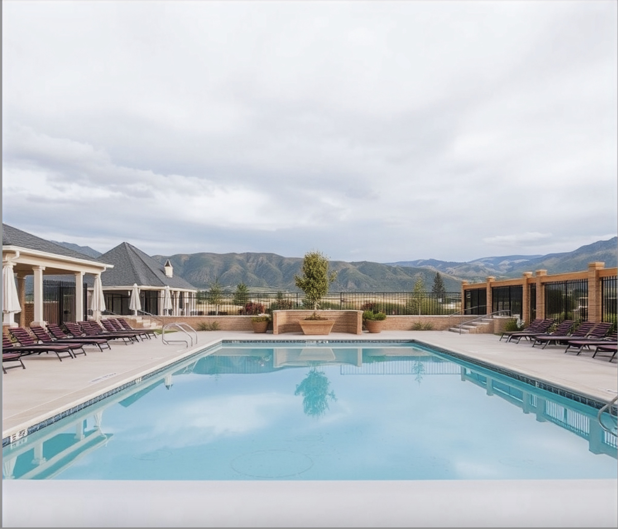 Community pool with mountain backdrop in northern Utah